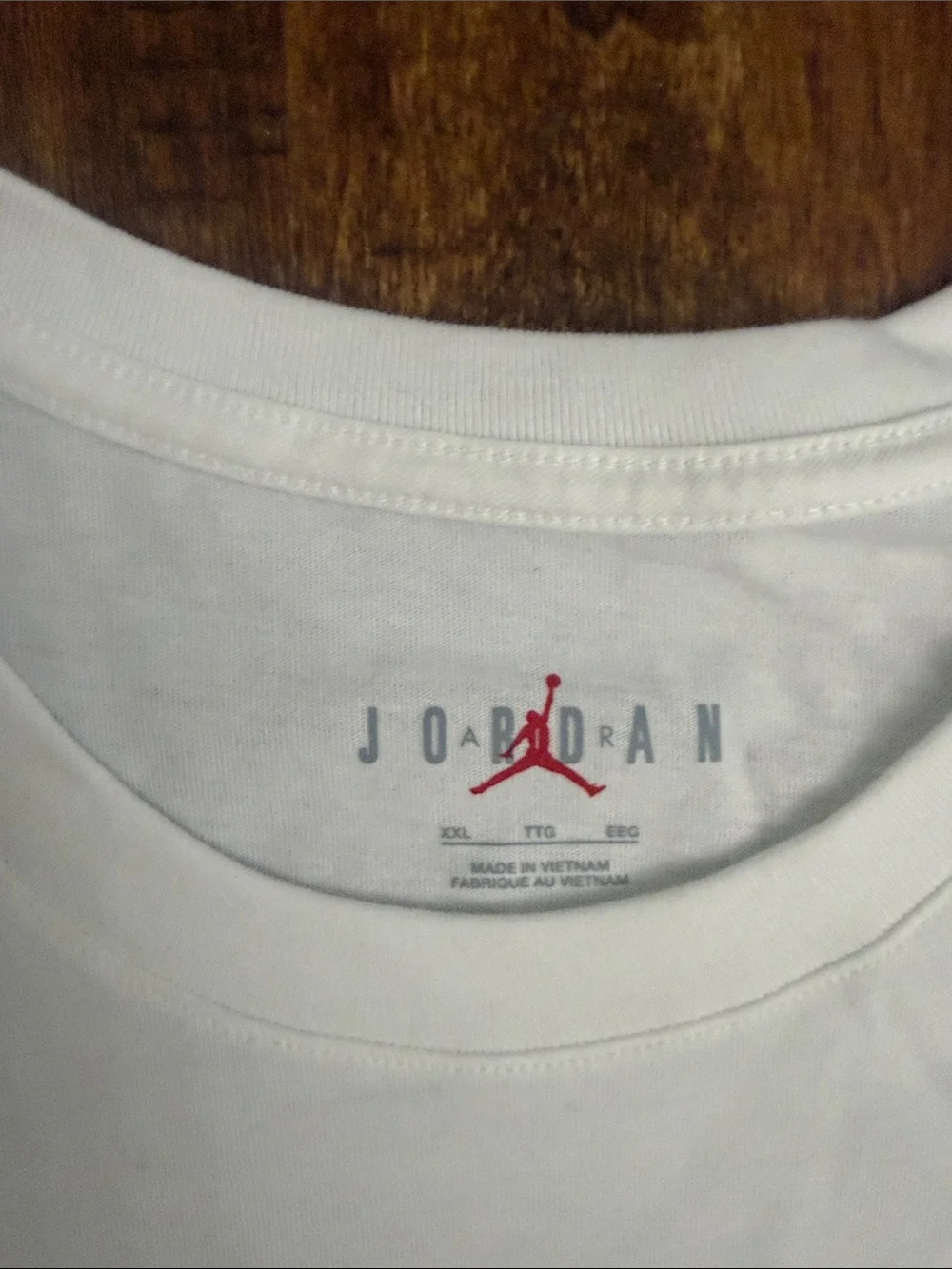 Jordan White Short-Sleeve Tee with Navy Logo Collage